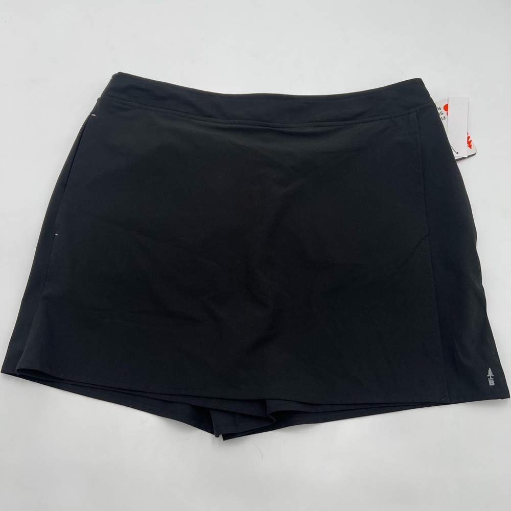 Women’s BassOutdoor Traveler Skort sz Medium. Shorts in the back, skirt in front